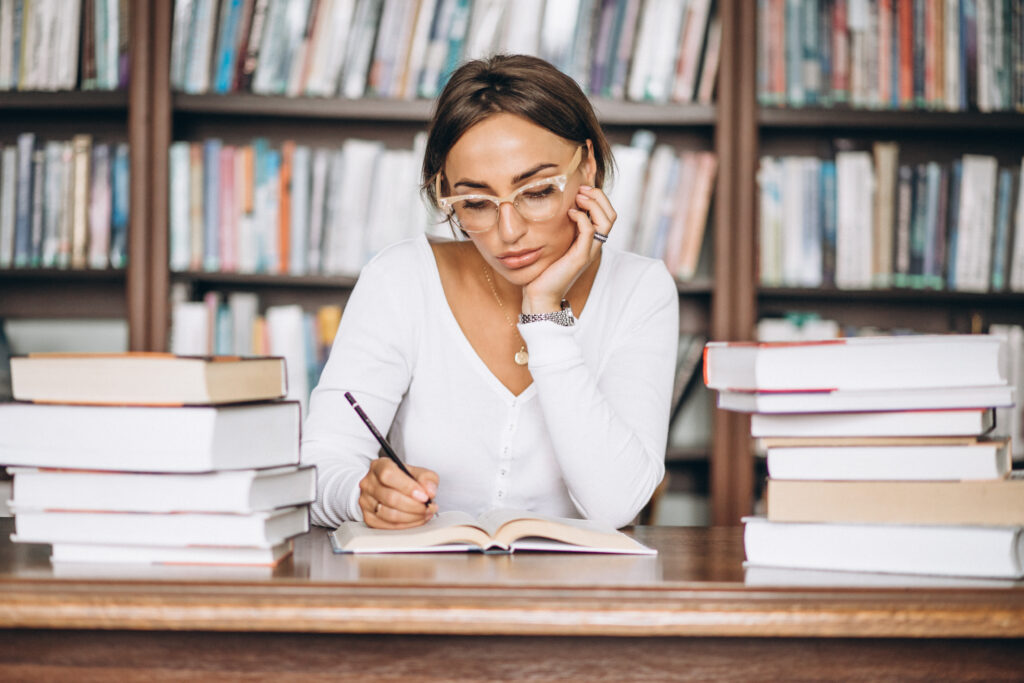 Student woman studying at the library